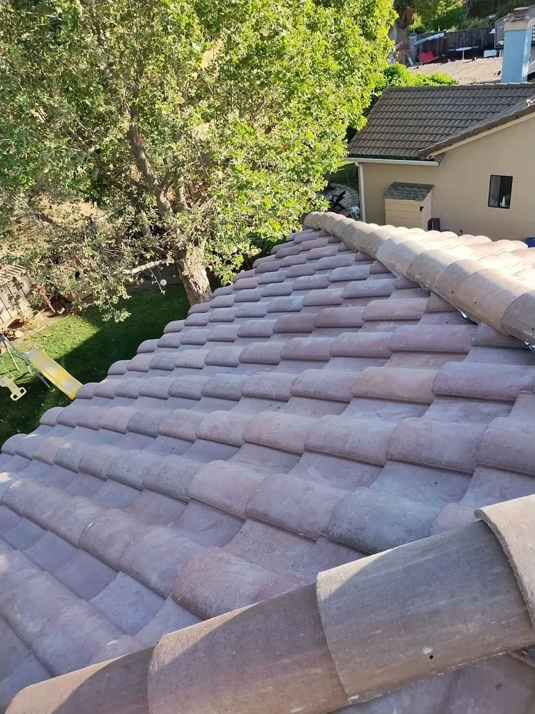 Slide of RR Alvarez Roofing