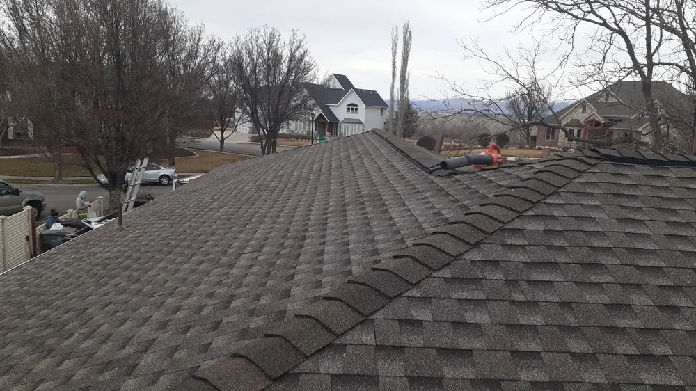 Slide of R&R Partner Roofing