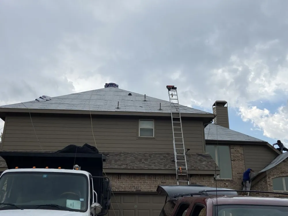 Slide of R&R Roofing