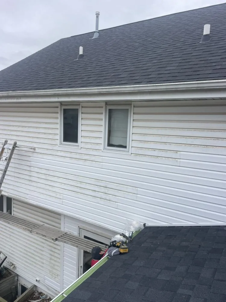 Slide of RR Siding And Construction