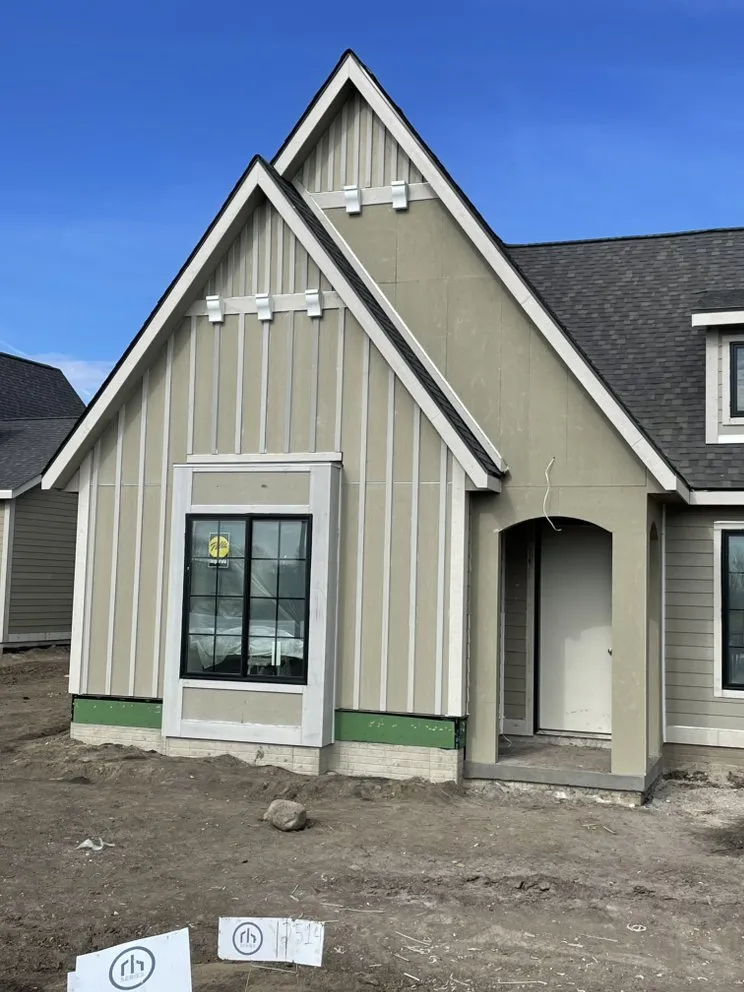 Slide of RR Siding And Construction