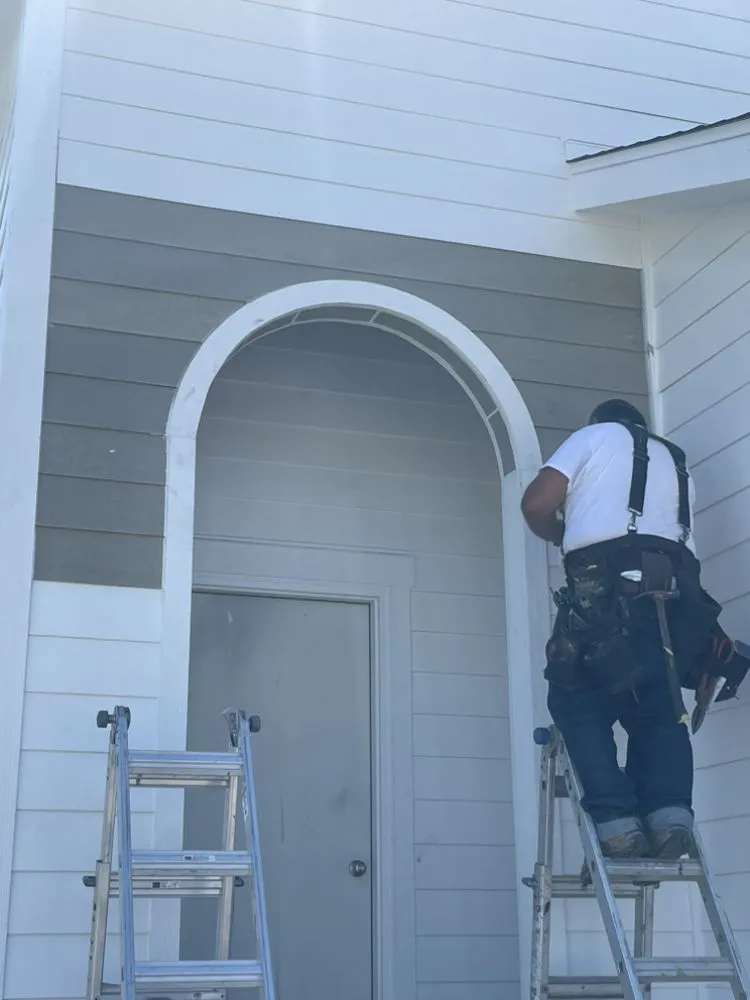 Slide of RR Siding And Construction