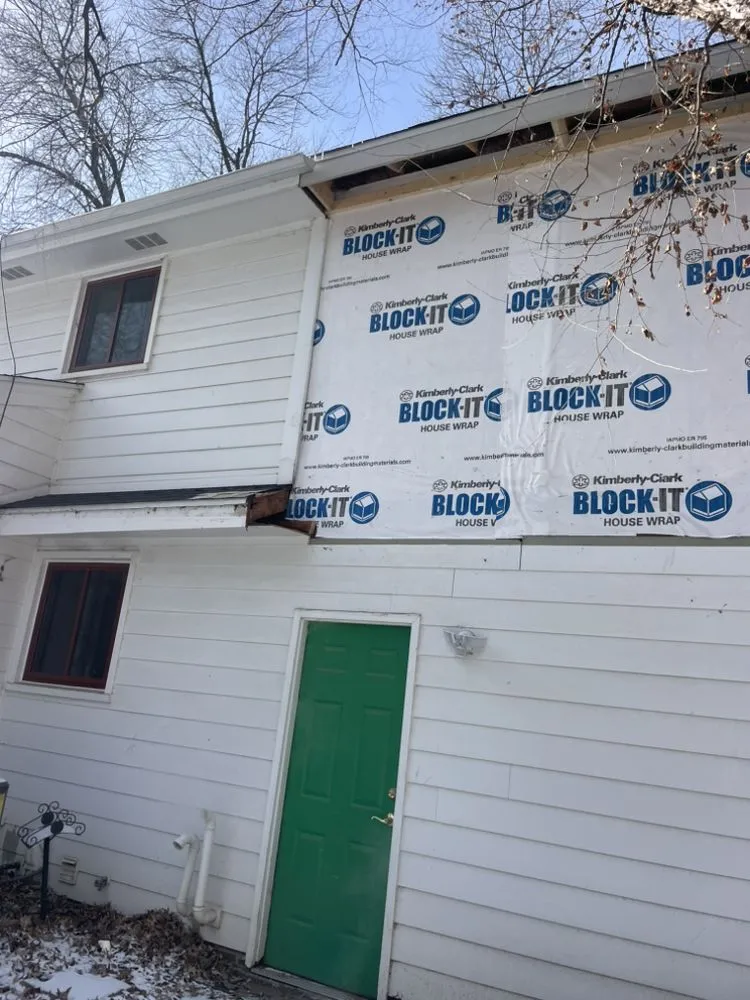 Slide of RR Siding And Construction