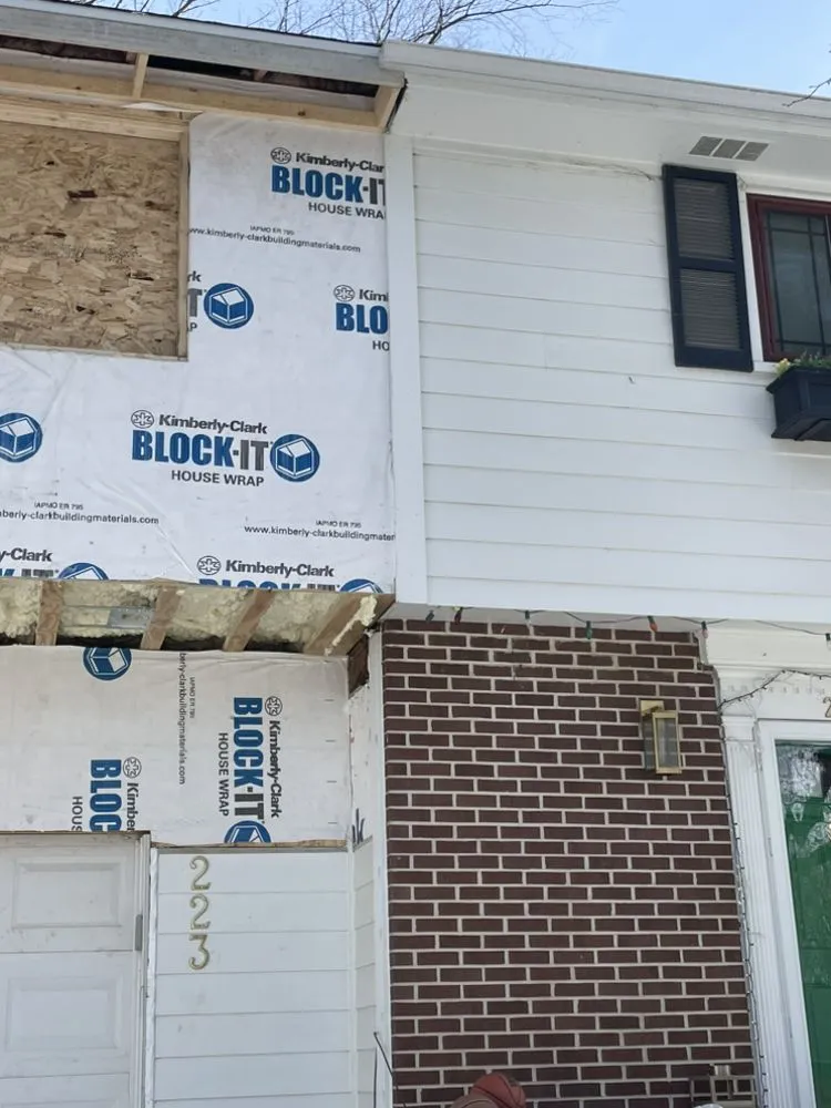 Slide of RR Siding And Construction