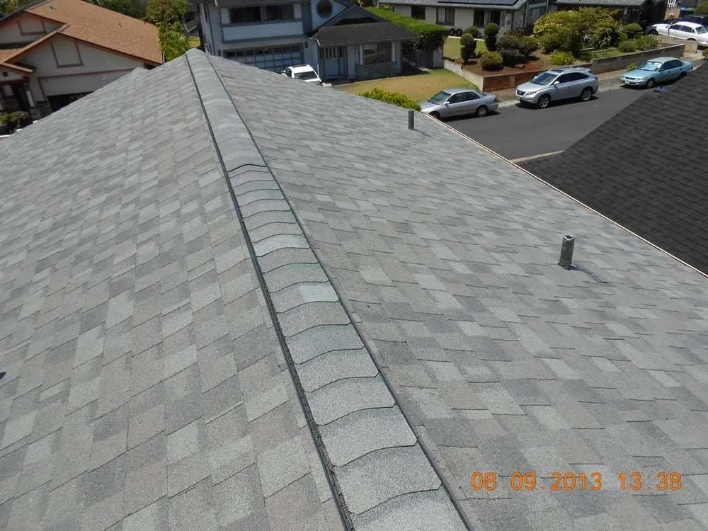 Slide of R.S. Toyama Roofing Service