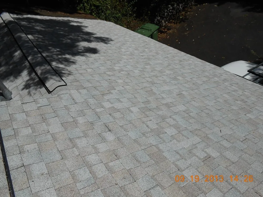 Slide of R.S. Toyama Roofing Service