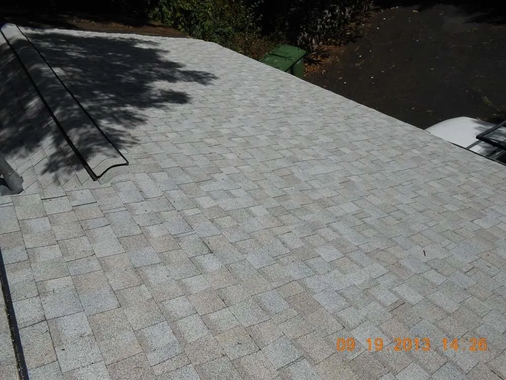 Slide of R.S. Toyama Roofing Service