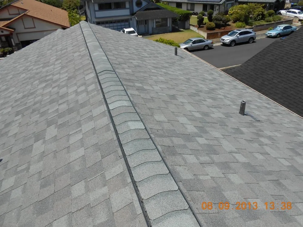 Slide of R.S. Toyama Roofing Service