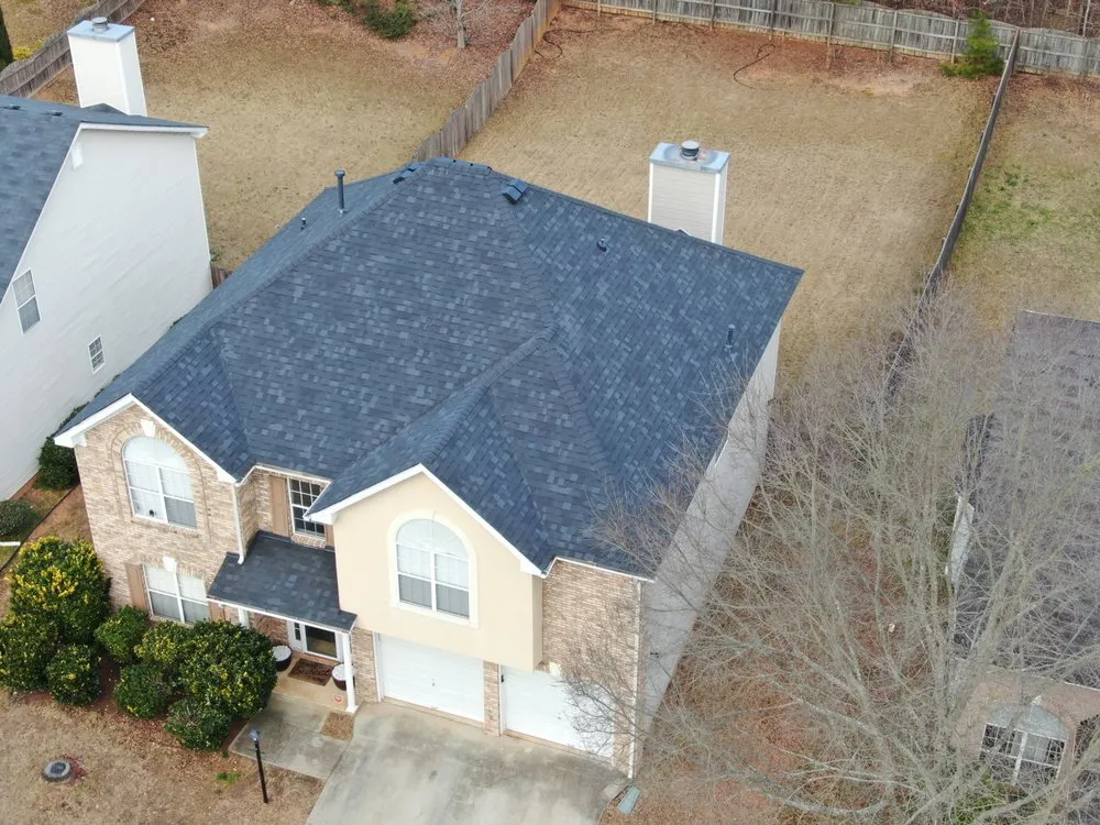 Slide of RST Roofing and Renovations