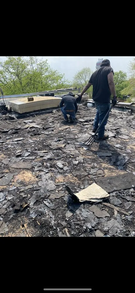 Slide of RT Roofing Exteriors