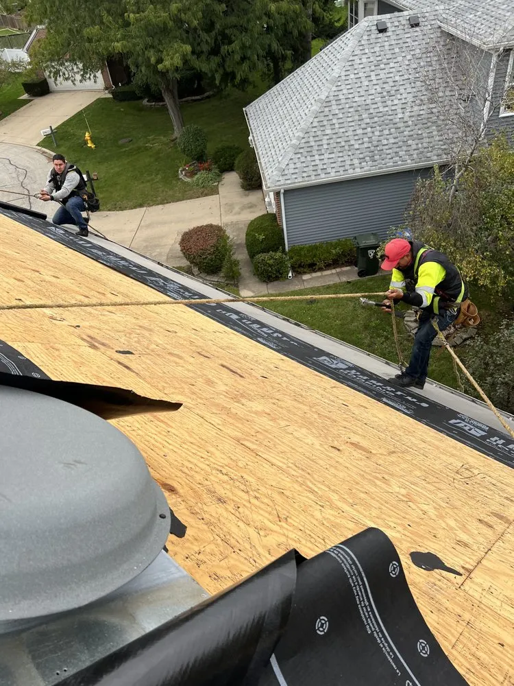 Slide of RT Roofing Exteriors