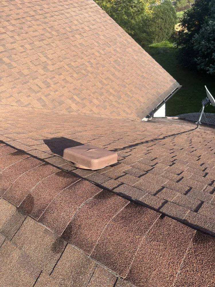 Slide of RT Roofing Exteriors