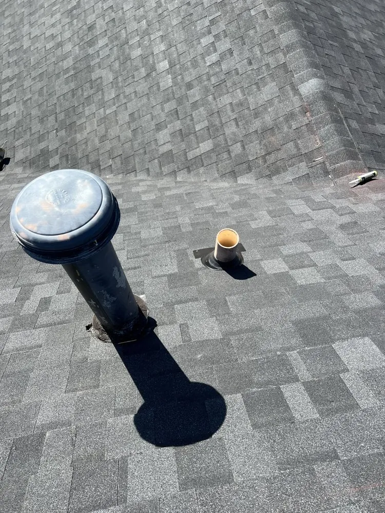 Slide of RT Roofing Exteriors