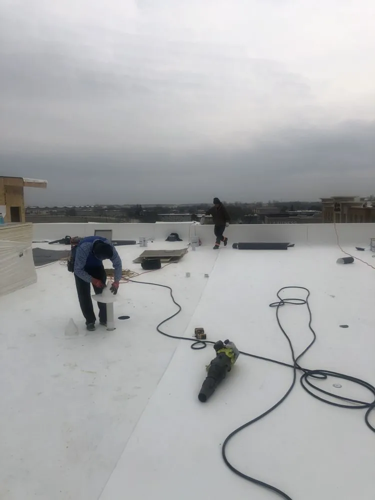 Slide of RT Roofing Exteriors