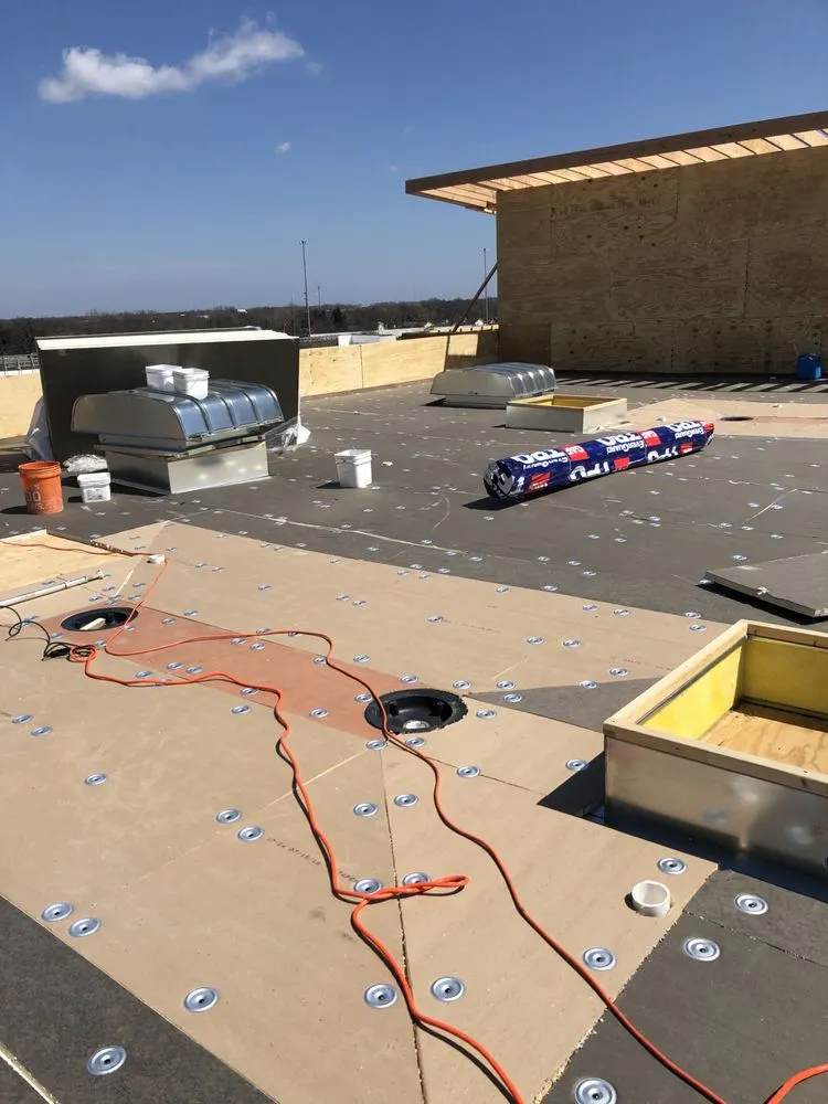 Slide of RT Roofing Exteriors