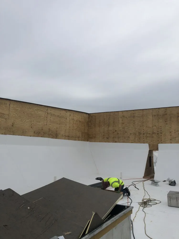 Slide of RT Roofing Exteriors