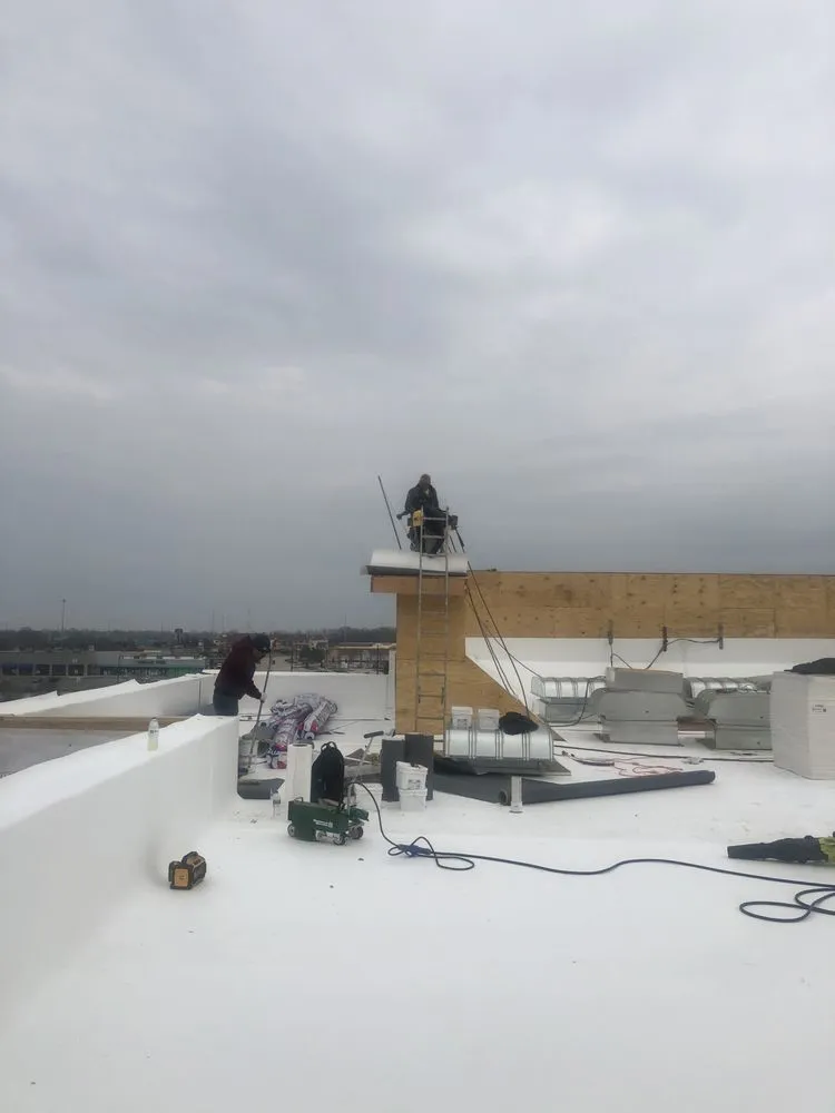 Slide of RT Roofing Exteriors