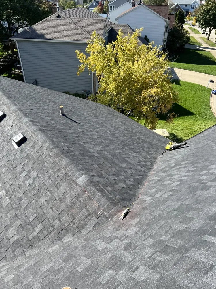 Slide of RT Roofing Exteriors