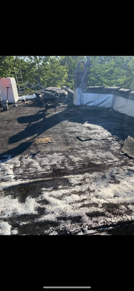 Slide of RT Roofing Exteriors