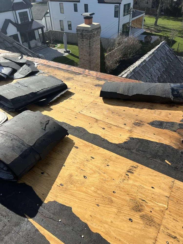 Slide of RT Roofing Exteriors