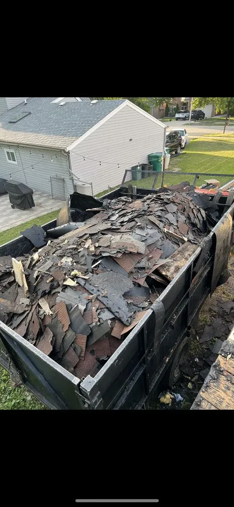 Slide of RT Roofing Exteriors