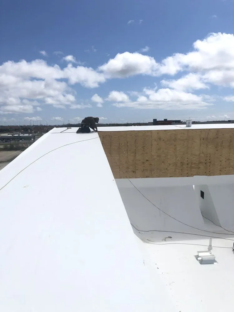 Slide of RT Roofing Exteriors