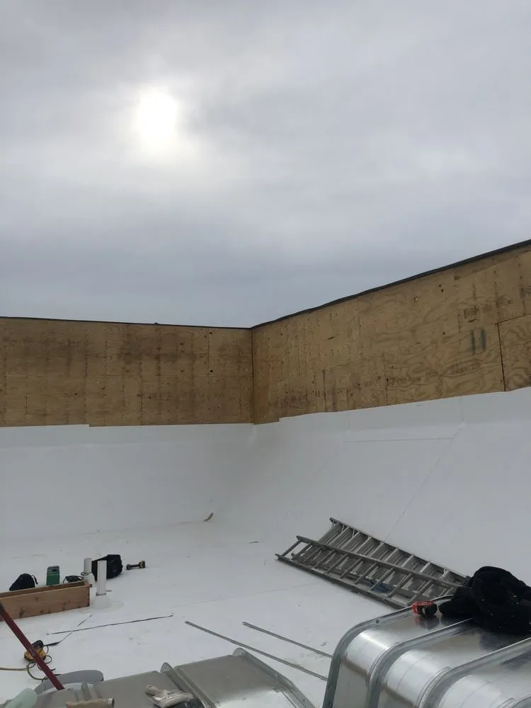 Slide of RT Roofing Exteriors