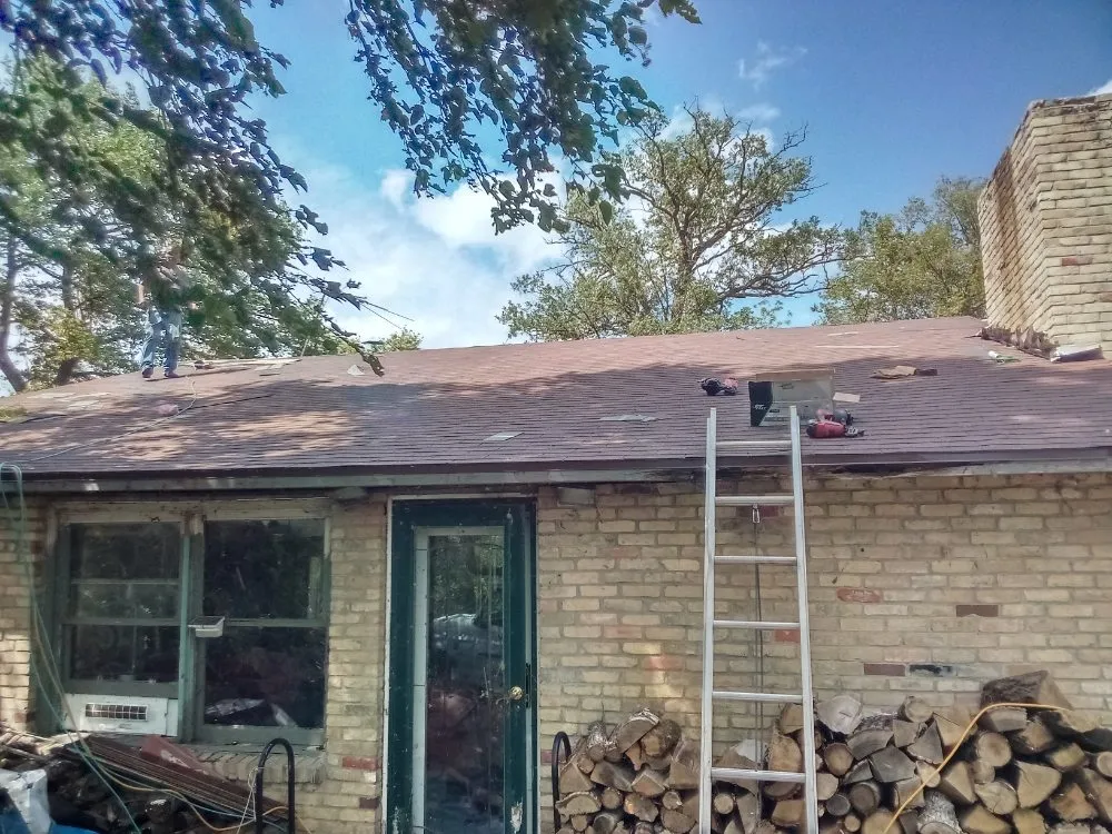 Professional storm damage roof repair in Ogema, MN by RT Roofing