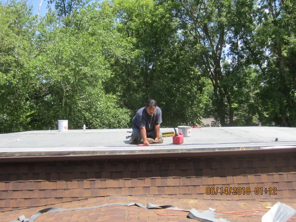 Local flat roof repair for residential properties in Ogema, MN by RT Roofing