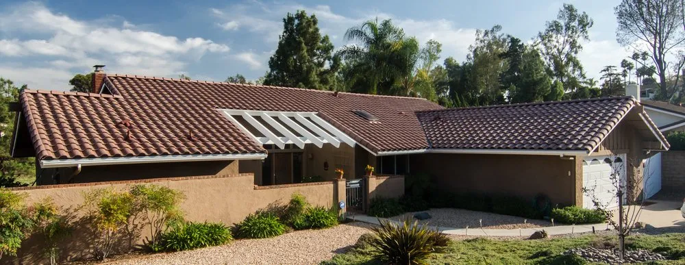 Slide of RT Roofing Specialist