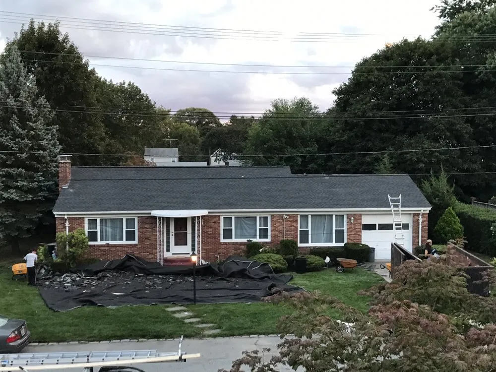 Slide of RTP Roofing