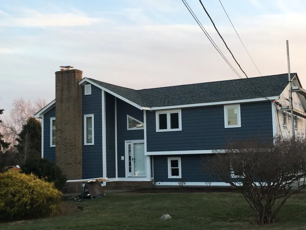 Slide of RTP Roofing