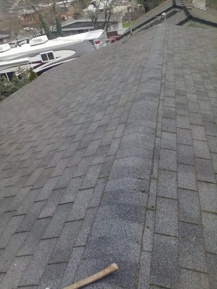 Slide of Ruben's Roofing