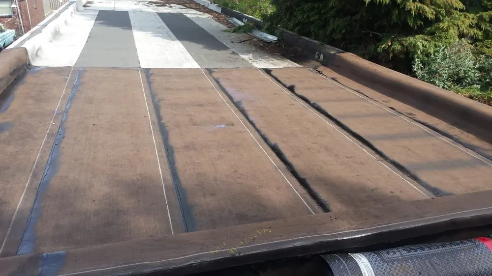 Slide of Ruben's Roofing