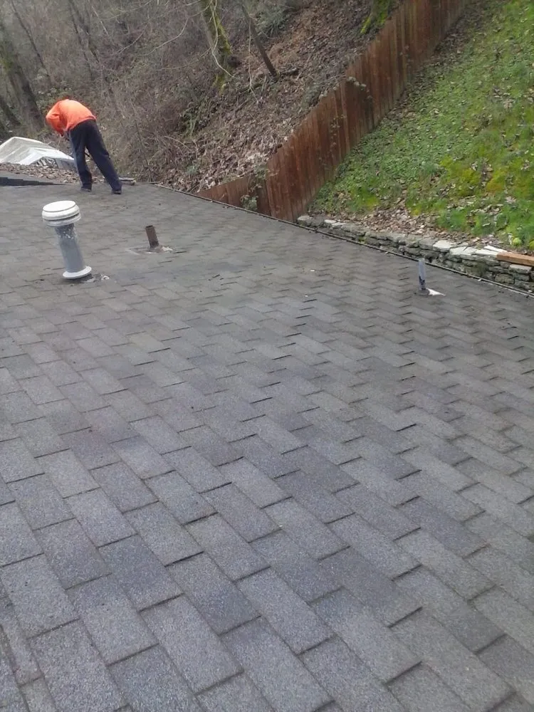 Slide of Ruben's Roofing