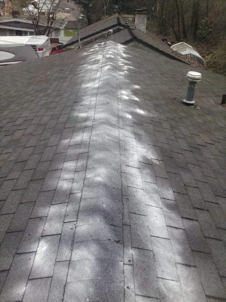 Slide of Ruben's Roofing