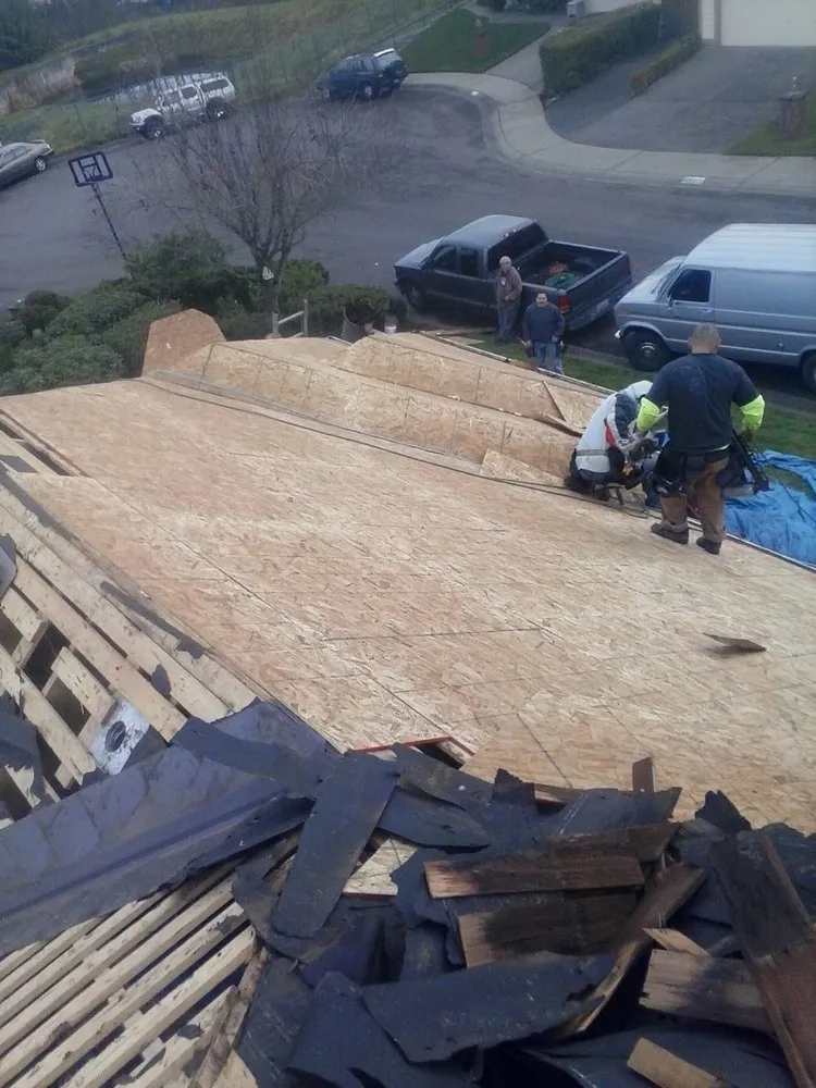 Slide of Ruben's Roofing