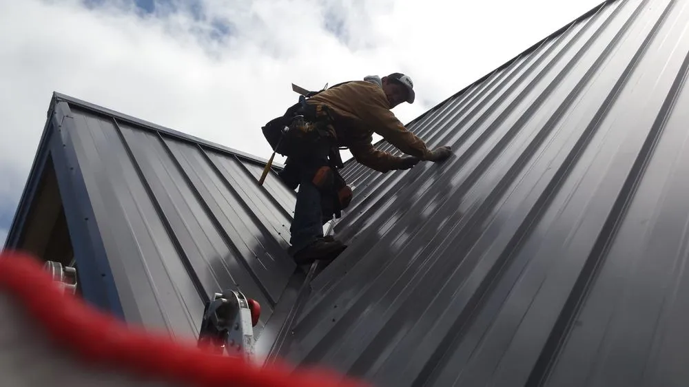 Slide of Ruben's Roofing