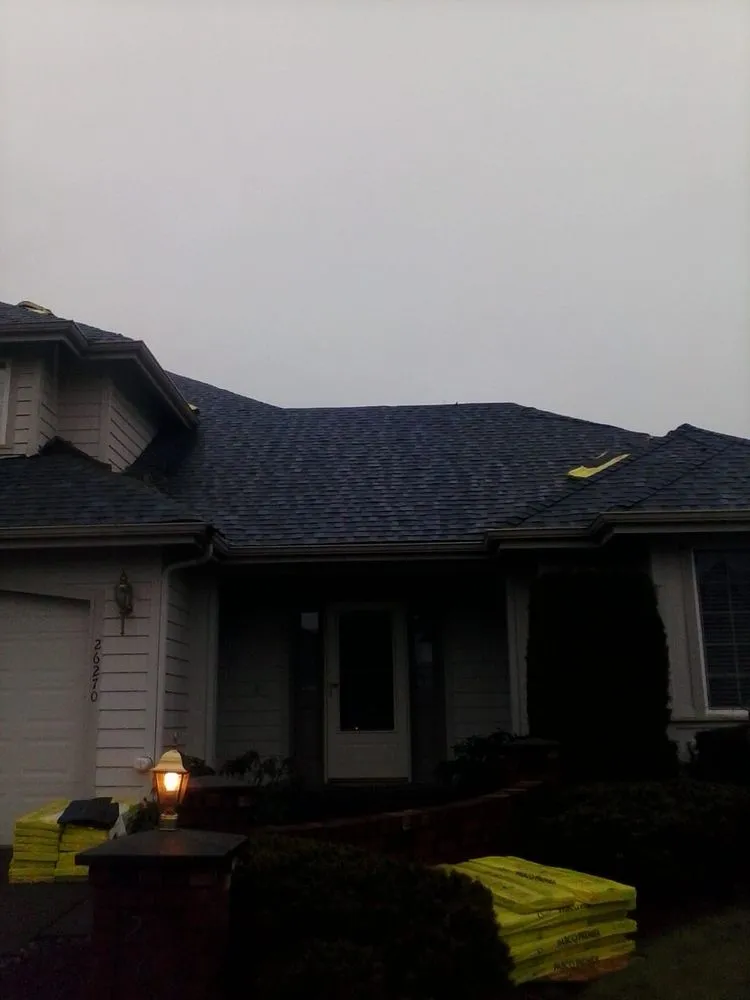 Slide of Ruben's Roofing