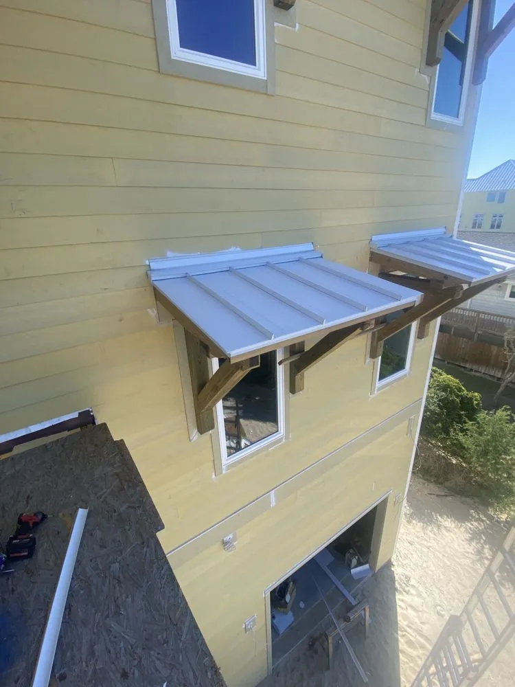 Slide of Rubio’s Roofing