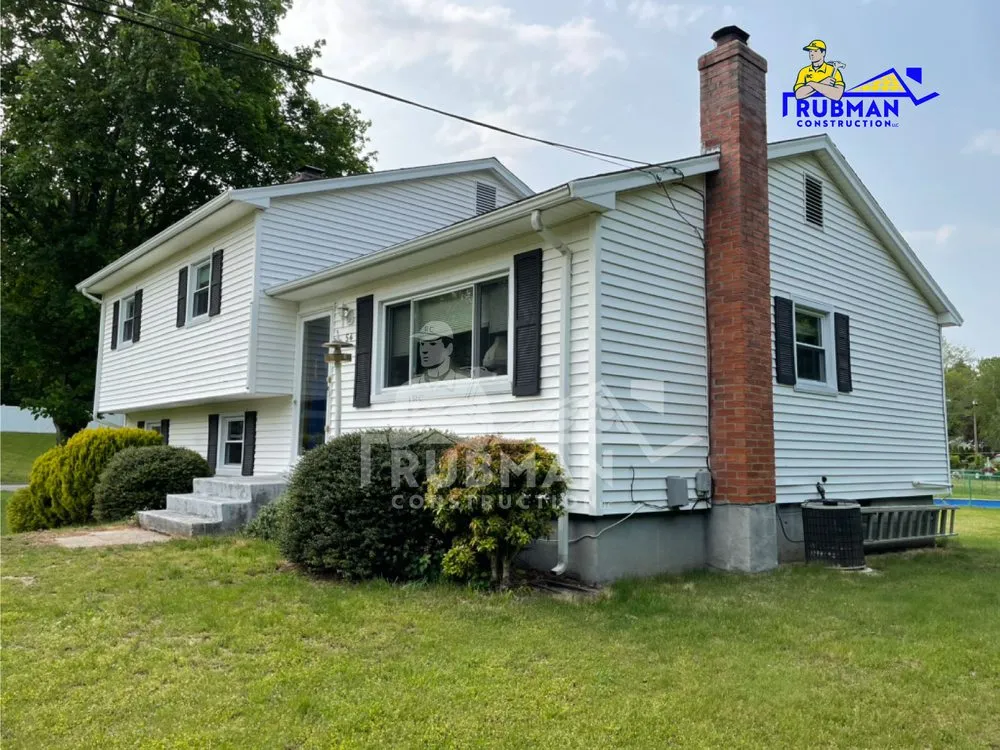 Slide of Rubman Construction