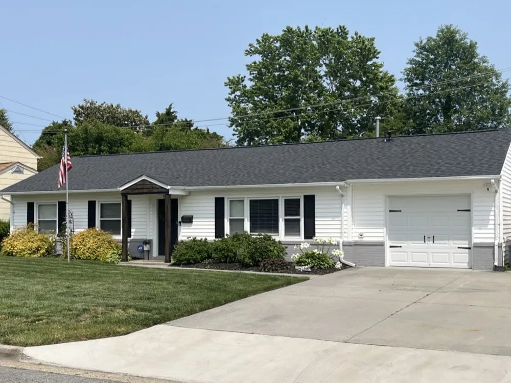 Slide of Rudman Roofing