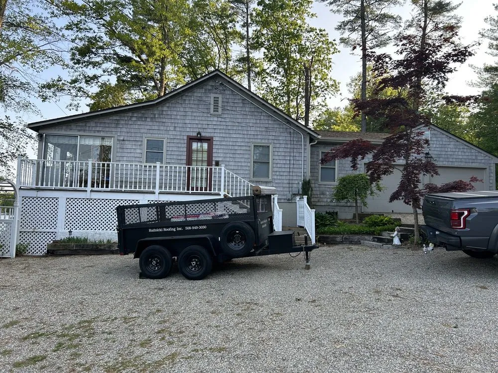 Slide of Rudnicki Roofing