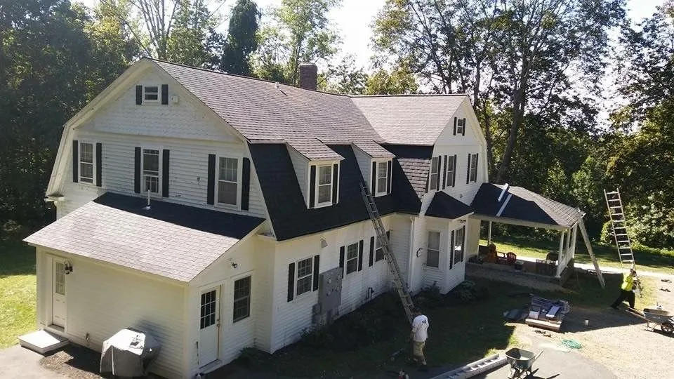 Slide of Rudnicki Roofing