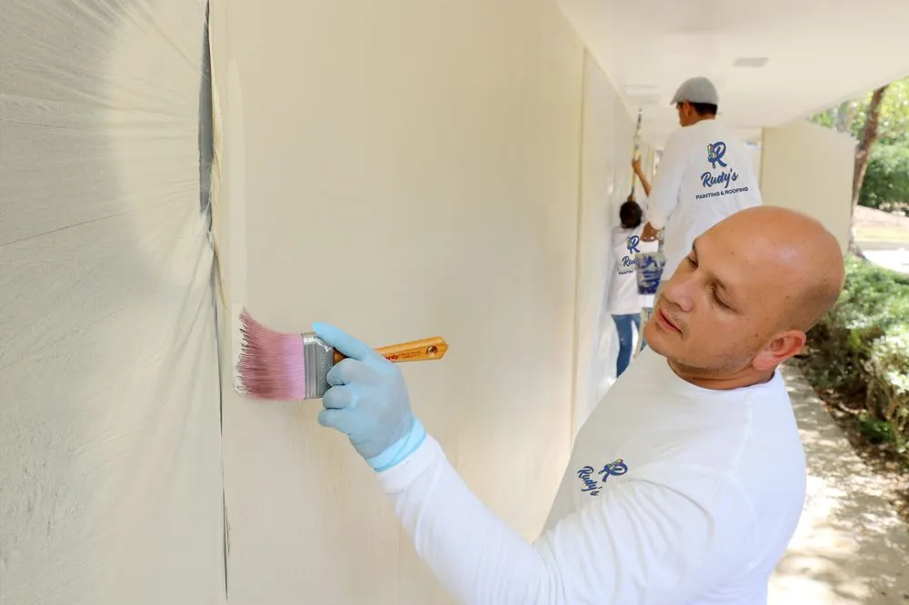 Slide of Rudy's Painting and Roofing