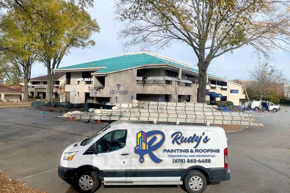 Slide of Rudy's Painting and Roofing