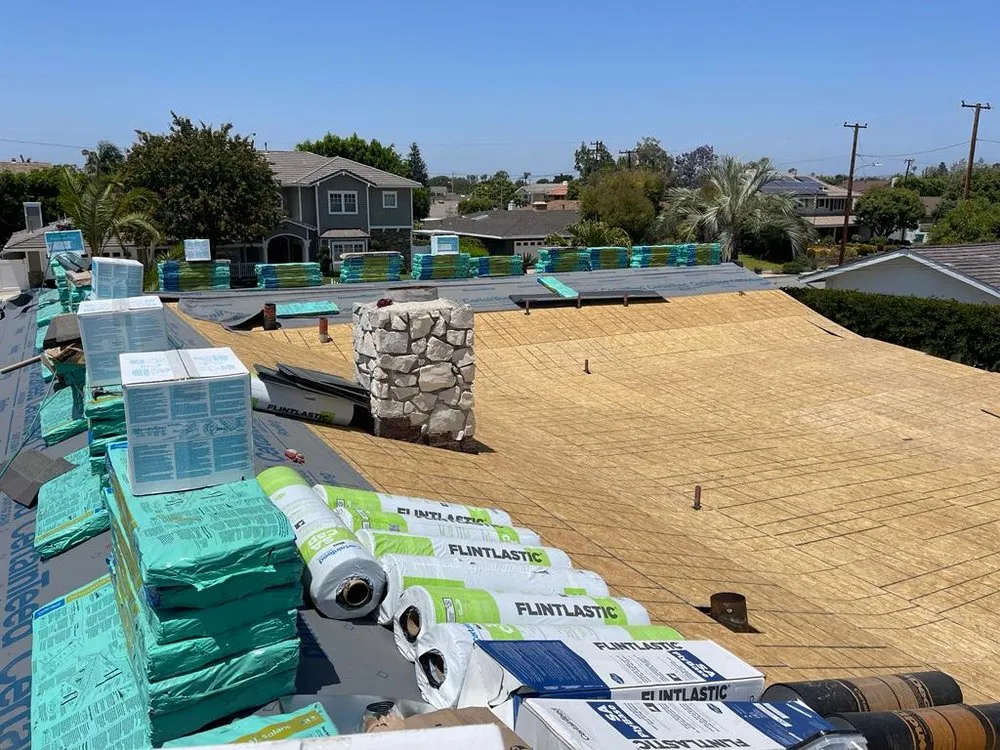 Slide of Rudy’s roofing