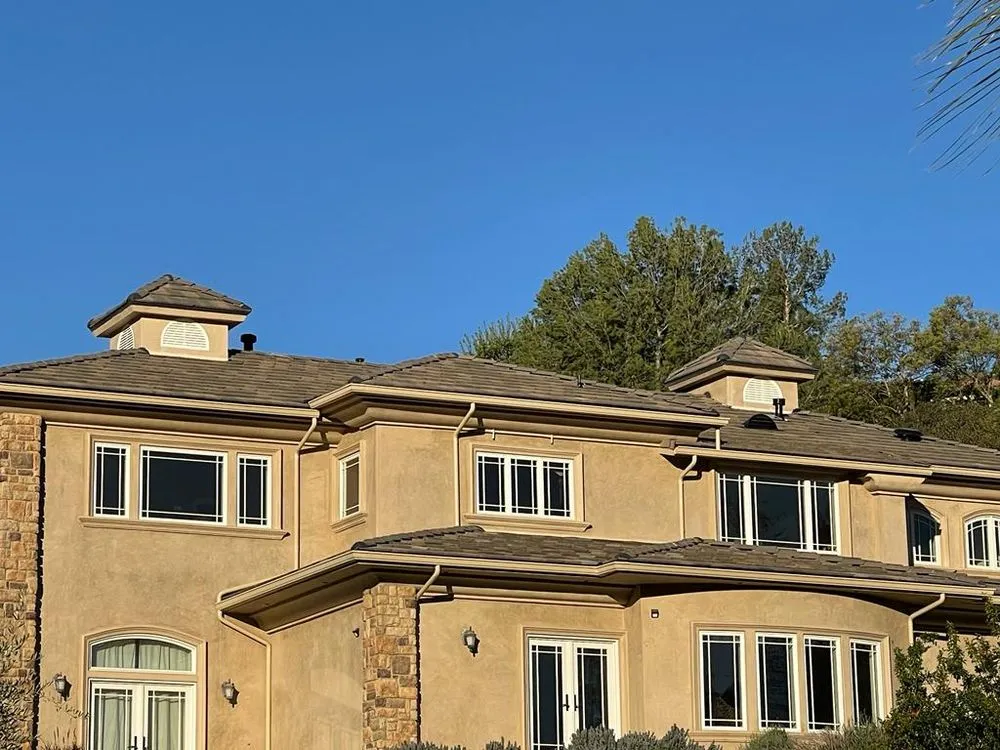 Slide of Rudy’s roofing