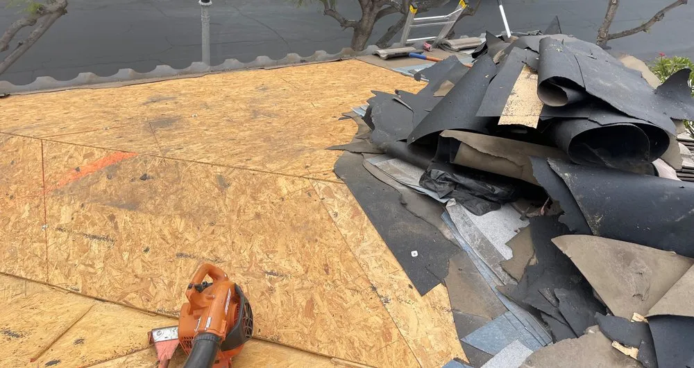 Slide of Rudy’s roofing