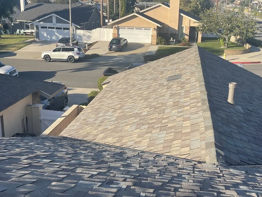 Slide of Rudy’s roofing